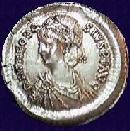 A coin with the image of the Emperor Theodosius II (c)1999 Princeton Economic Institute