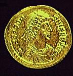 A coin with the image of the Emperor Theodosius I (c)1998 Princeton Economic Institute